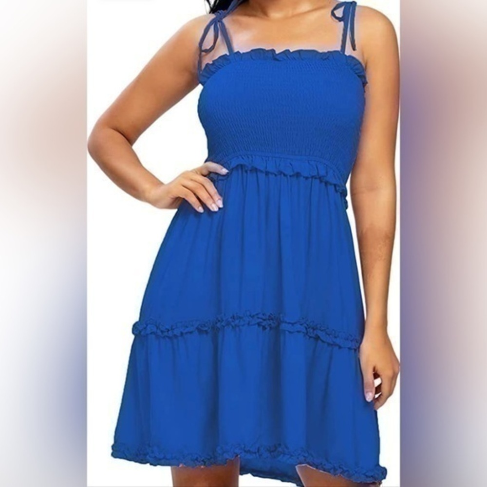 Timathous Blue Peasant Boho sun dress, size medium.


Gently worn. Straps are